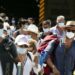 Medical staff collects  swab samples from passengers to test for the COVID-19 coronavirus at the port of Piraeus, in Athens, on August 16, 2020 / Δειγματοληπτικοί έλεγχοι για τον Covid-19 σε ταξιδιώτες στο λιμάνι του Πειραιά, στίς 16 Αυγούστου, 2020