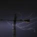 epa04390758 A picture made available on 08 September 2014 shows lightning behind a crane during a summer thunderstorm in San Sebastian, northern Spain, 07 September 2014.  EPA/JAVIER ETXEZARRETA