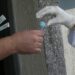 A man receives a self coronavirus test from a medical student on his doorsteps, amid the coronavirus disease (COVID-19) outbreak, in Sao Caetano do Sul, Sao Paulo State, Brazil, April 14, 2020. REUTERS/Rahel Patrasso