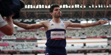 Miltiadis Tentoglou, of Greece, celebrates in men's long jump final at the 2020 Summer Olympics, Monday, Aug. 2, 2021, in Tokyo. (AP Photo/Matthias Schrader)