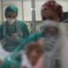 Members of the medical staff treat coronavirus disease (COVID-19) positive patients at the intensive care unit (ICU) of the Sotiria hospital, in Athens, Greece, November 12, 2021. Picture taken November 12, 2021. REUTERS/Giorgos Moutafis