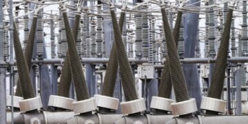 Coal-fired electricity is transmitted through a substation at Intermountain Power Plant on Wednesday, June 22, 2022, in Delta, Utah. In three years, the power lines will start being used to transport power generated with hydrogen to consumers in California and elsewhere. (AP Photo/Rick Bowmer)