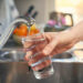Filling up a glass of water
