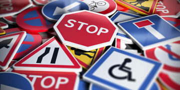 Perspetive view of numerous french traffic road signs. Concept image for background, 3D illustration