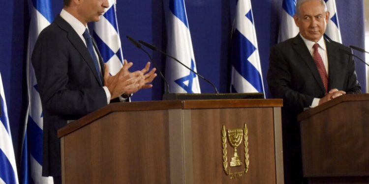 Israeli Prime Minister Benjamin Netanyahu, right,  and Greek Prime Minister Kyriakos Mitsotakis give joint statements in Jerusalem, Tuesday, June 16, 2020. (Debbie Hill, UPI Pool via AP)